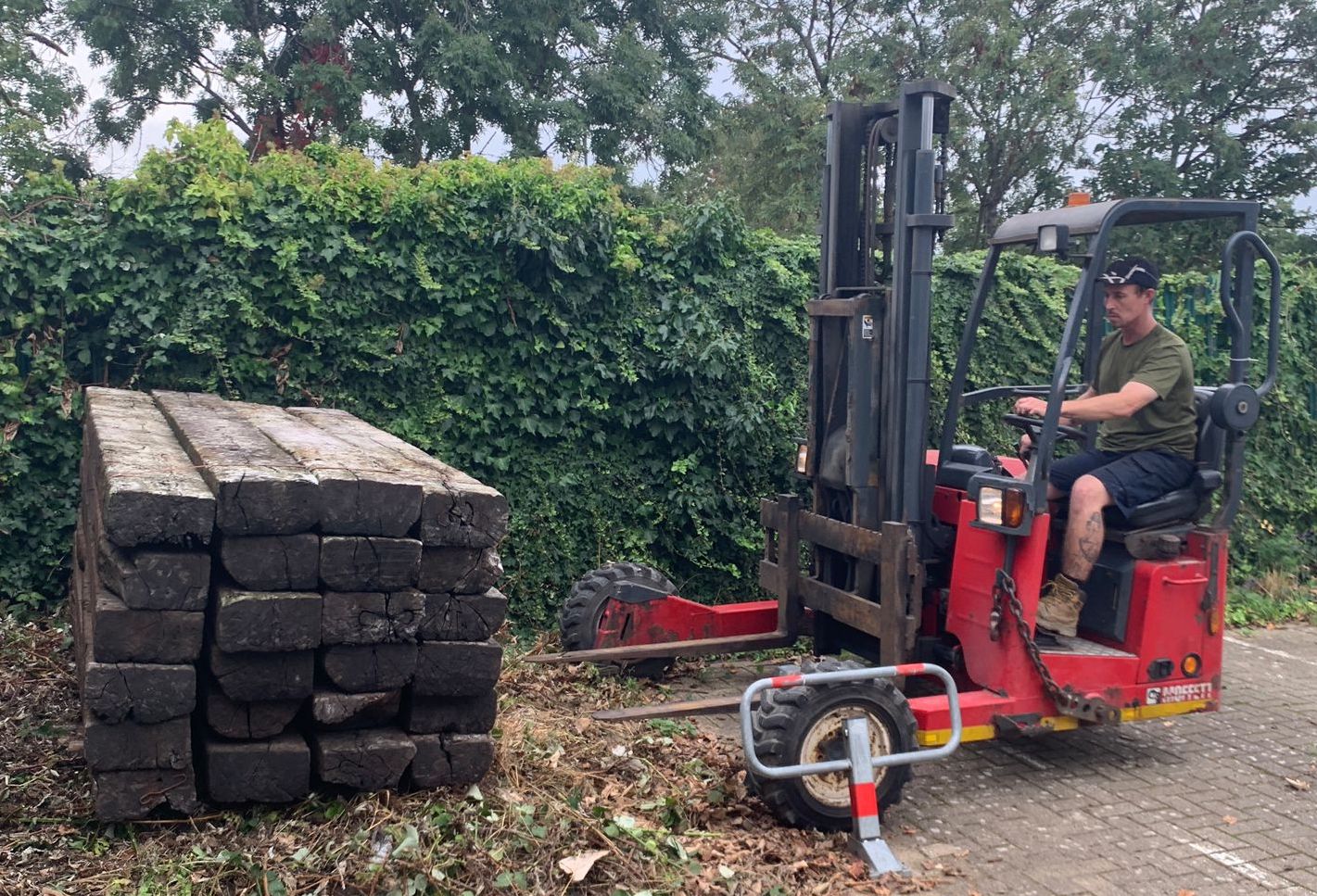 Premium Lorry offload of railway sleepers with a forklift. Railwaysleepers.com