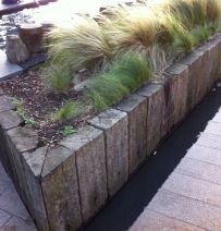 Raised beds from old hardwood railway sleepers in Liverpool city centre. Railwaysleepers.com