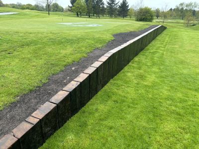FLOWING GOLF COURSE WALLS & EDGING WITH RECLAIMED OAK RAILWAY SLEEPERS