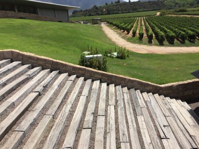 AN AMAZING COLLECTION OF RAILWAY SLEEPER STEPS AT MONTES BEAUTIFUL VINEYARD